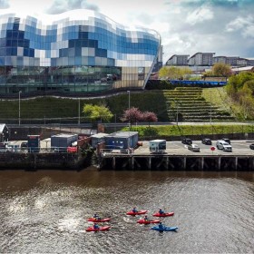 A group of people kayaking on the River Tyne